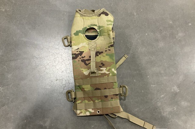 GENUINE US MILITARY MULTI-CAMO HYDRATION BACKPACK WITHOUT BLADDER.PRE OWNED USED