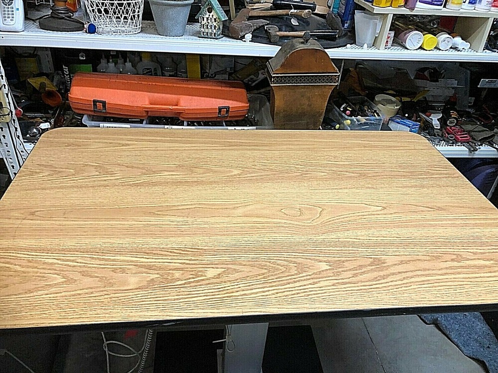 Huasmann electronic elevating table 4375 work surface adjustable 27” to 43” high