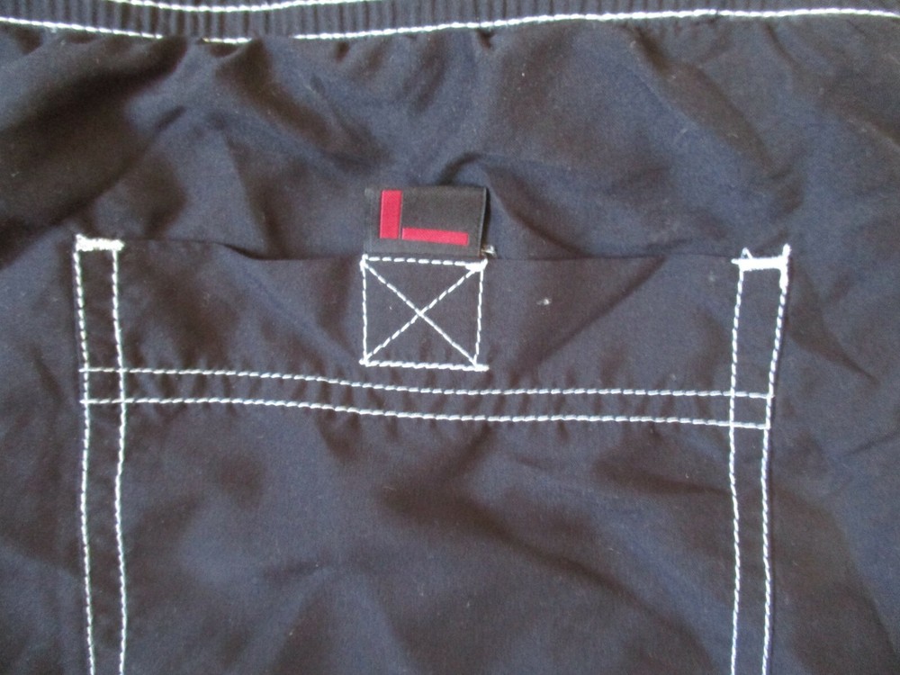 FUBU BLACK AND RED SWIM TRUNKS / BOARD SHORTS - SIZE MEDIUM