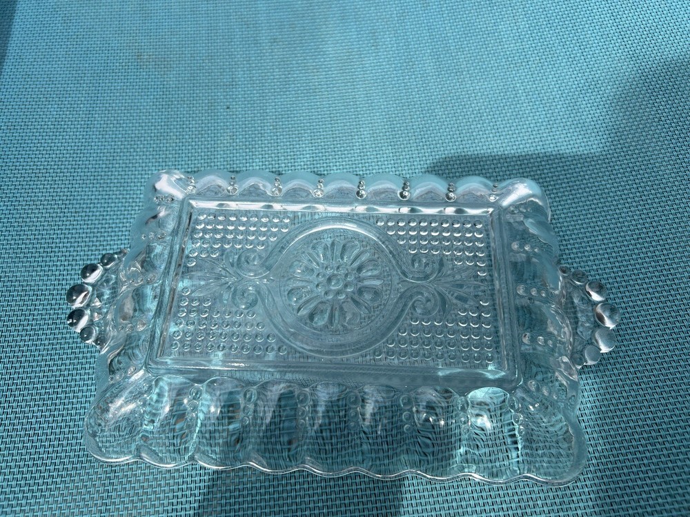 small rectangle shape crystal server with handles.  In good condition.