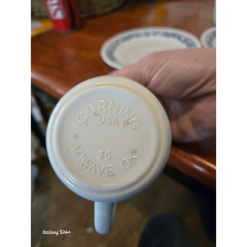 Corelle olde time pattern cups and saucers. 2 each.