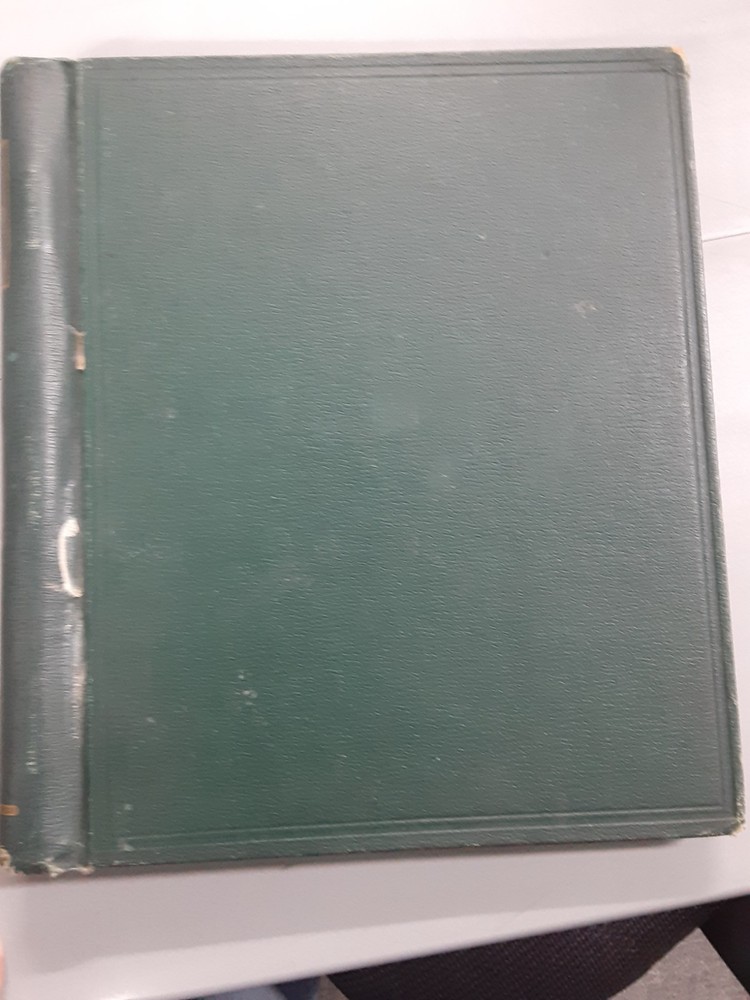 850+ World Wide stamps on quadrille pages in spring back cover