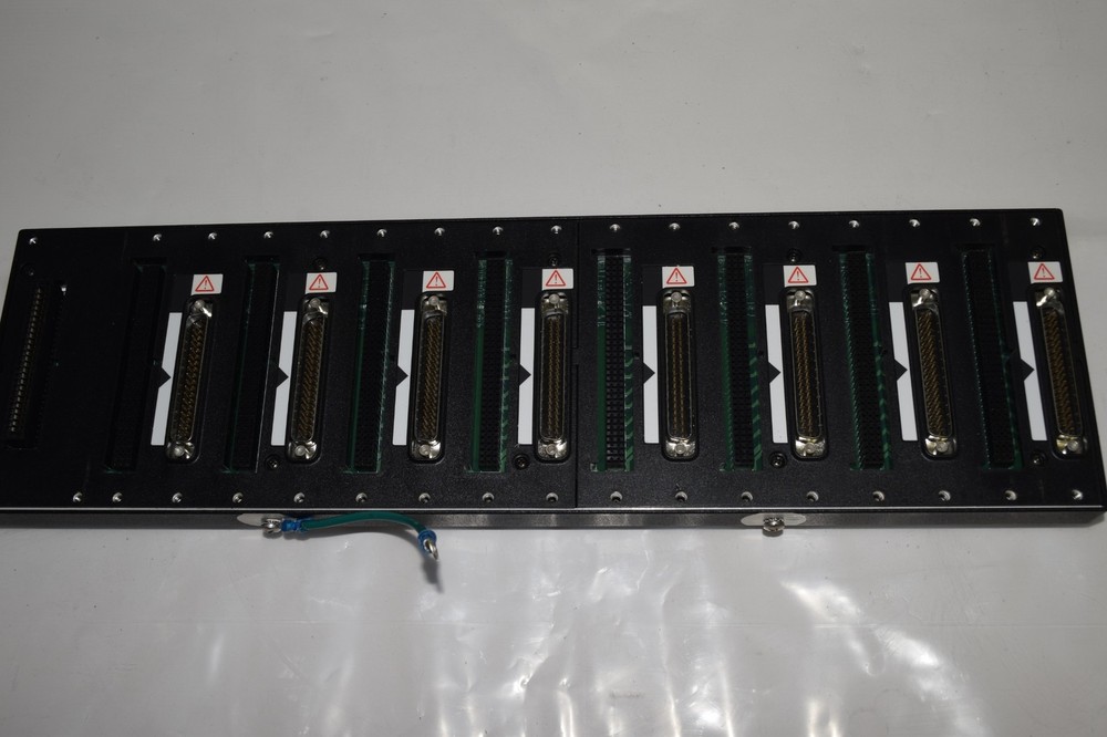 ^^ NATIONAL INSTRUMENTS MODEL CFP-BP-8 8-SLOT BACKPLANE (SMS97)