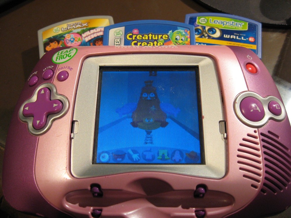 LeapFrog Leapster Learning Game System + 3 Dora Creature Pixar Wall Games WORKS
