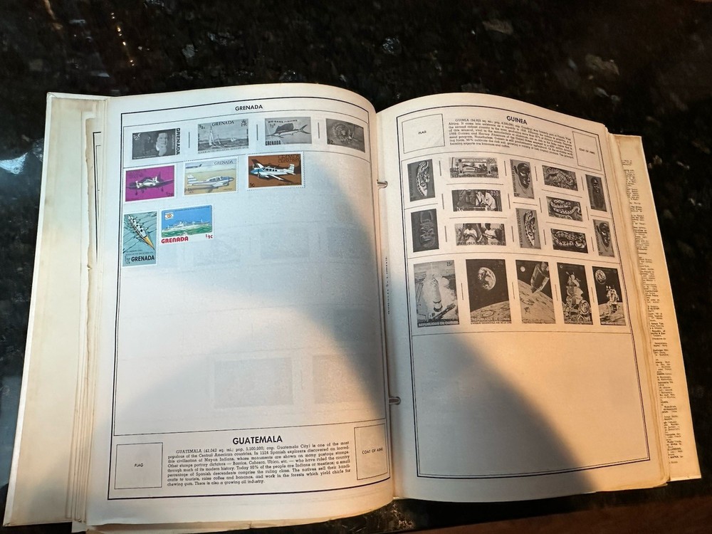 VTG 1977 Traveler Stamp Album With Many Stamps.