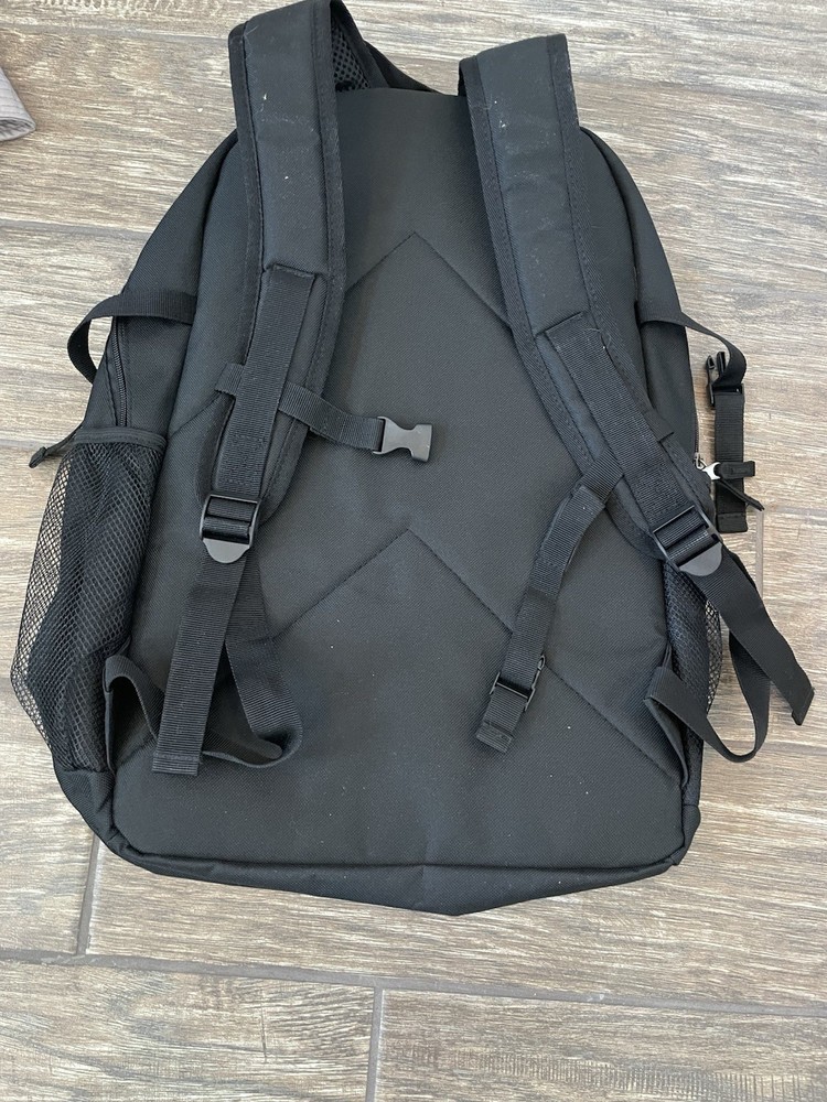 IRONMAN Triathlons, Backpack, Non Race Specific. Features The M-Dot Logo