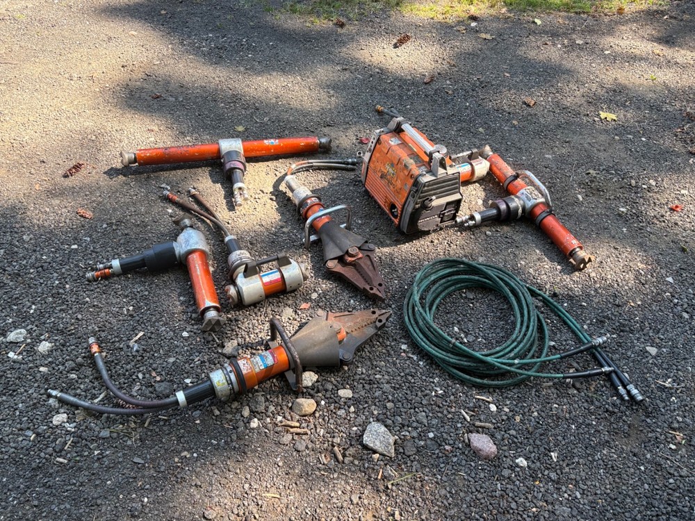 Holmatro rescue tools.  Includes gas pump and assorted tools
