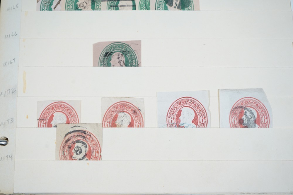 US COLLECTION OF 1,200+ STATIONERY CUT SQUARE STAMPS STORED IN STOCKBOOK