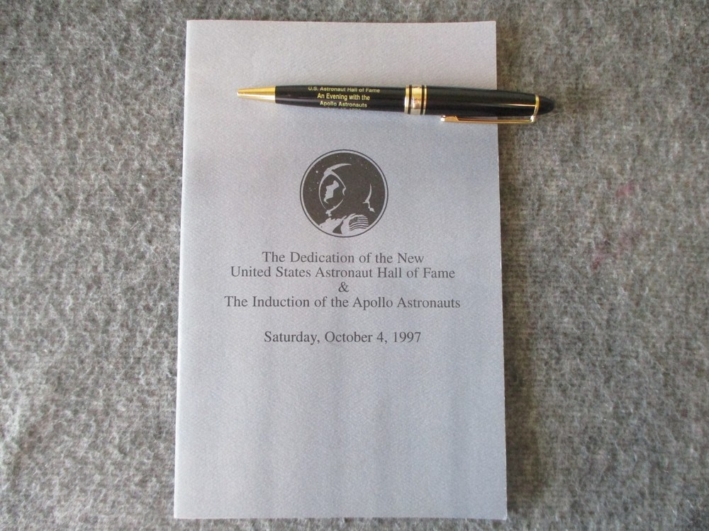 NASA APOLLO ASTRONAUT INDUCTION PROGRAM SIGNED BY WALTER M. SCHIRRA + PEN