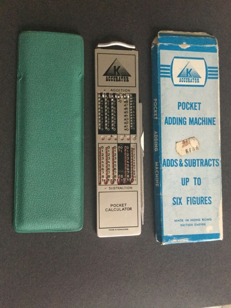 K ACCURATOR. POCKET ADDING MACHINE  EXCELLENT CONDITION