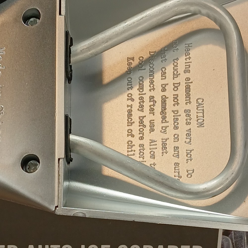 Totes Heated Auto Ice Scraper with a built-in flashlight.
