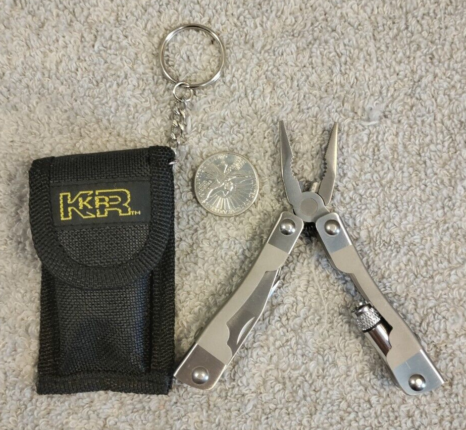 KR Multi-Tool. Belted Case And Key Ring.  Light not tested.  Pre-owned very nice