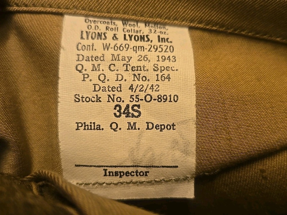 WWII dated 1943 Size 34/S Brown buttons wool overcoat.