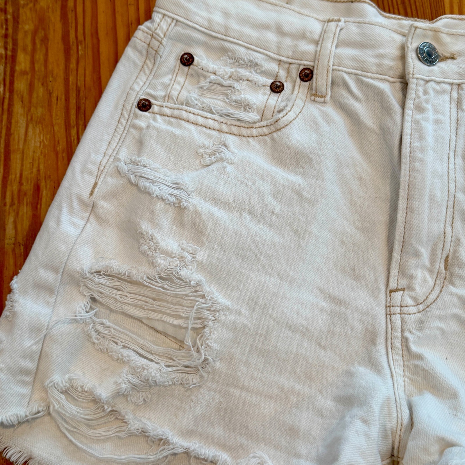 American Eagle White Distressed High Waisted Denim Shorts Size 4 Raw Hem