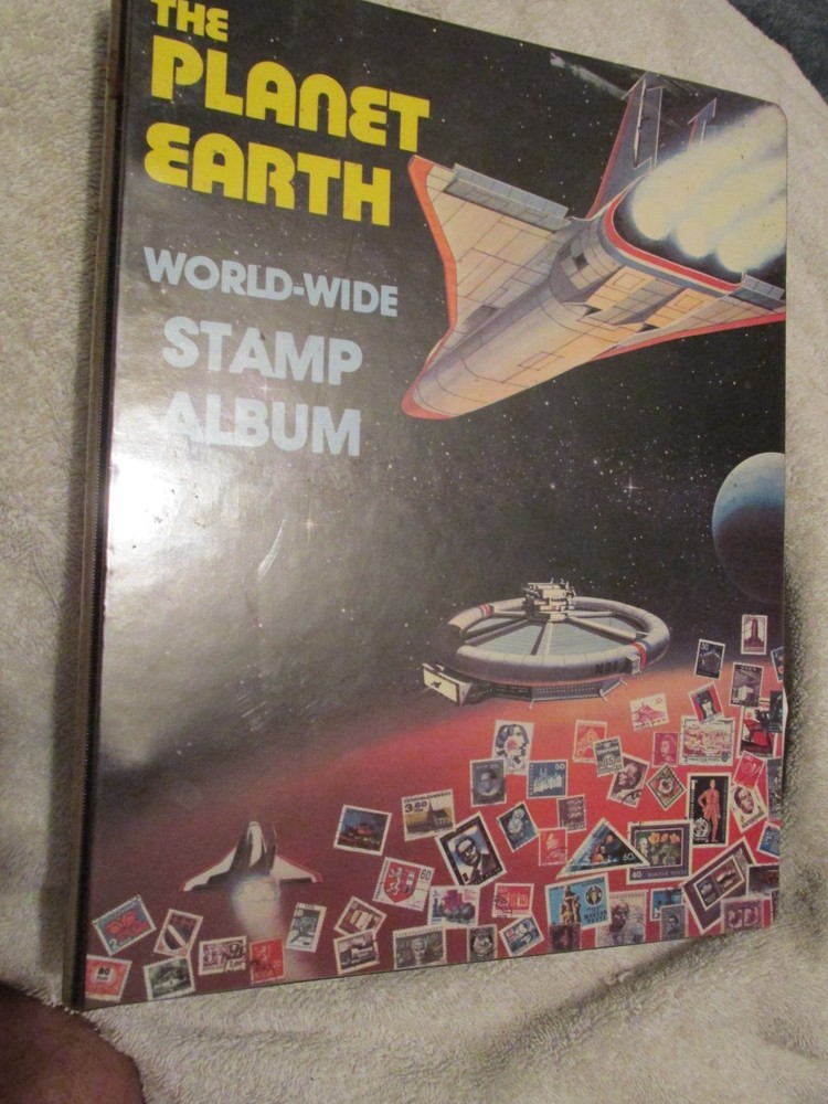 VINTAGE Planet Earth Worldwide Stamp Album Preowned wit FEW STAMPS
