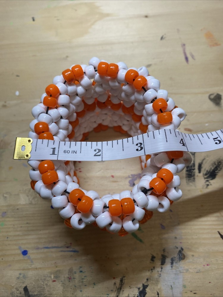 Orange And White Kandi Rotator Cuff
