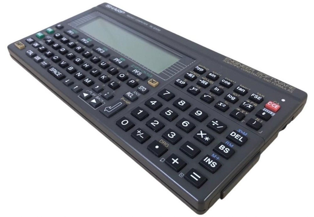 Sharp PC-E500 pocket computer 32KB memory large display BASIC language C338