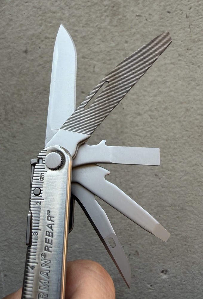 LEATHERMAN 'REBAR' AD/PROMO HUBER ENGINEERED WOODS STAINLESS MULTITOOL 17 TOOLS