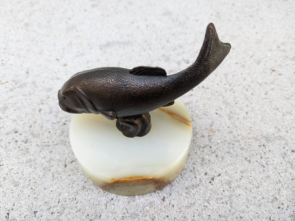Solid Bronze Sculpture mounted on Onyx Base