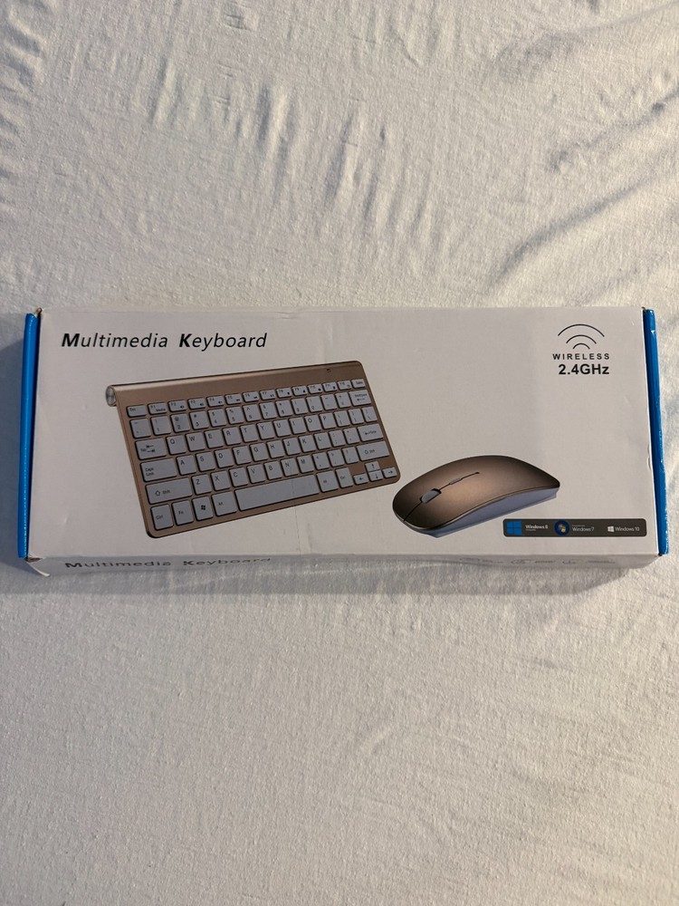 Multimedia Wireless Keyboard/Mouse New in Orginal Box