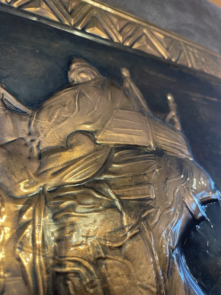 Middle Eastern repoussé metal wall plaque