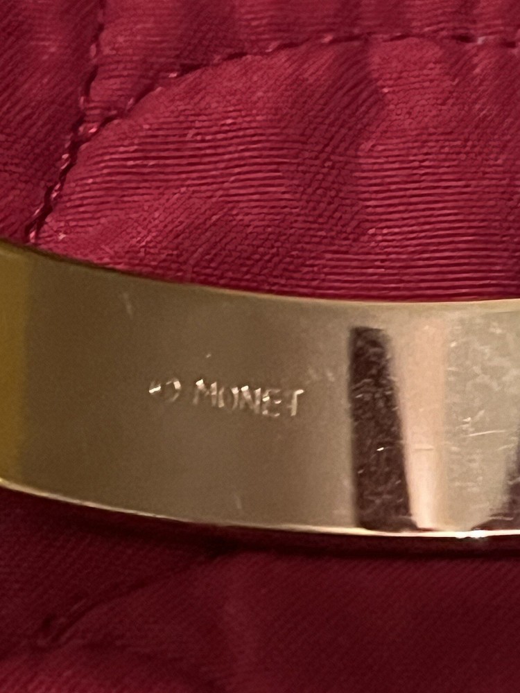 MONET LIGHT GREEN BANGLE BRACELET 2 1/2 DIAMETER.SIGNED.