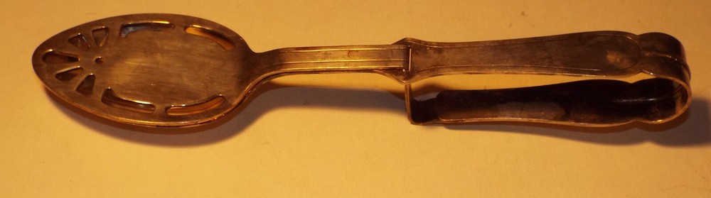 SILVERPLATE SQUEEZE SERVING SPOON STRAINER F AND HAND HALLMARK