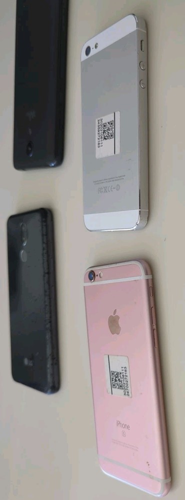 4 cell phones mixed lot. multiple different brands. untested for parts