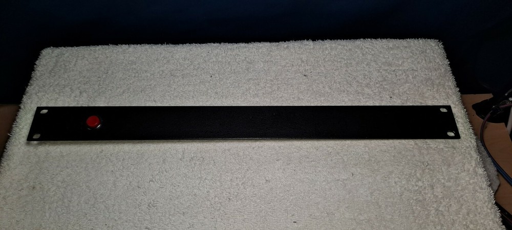 1RU black rack panel with momentary switch