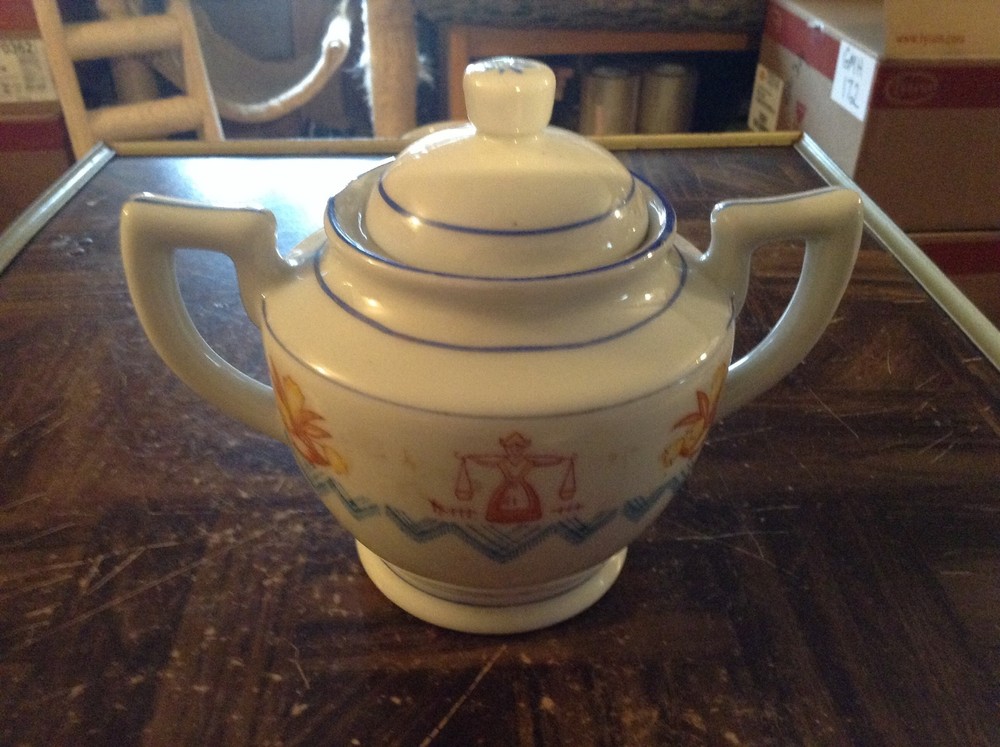 2 handled porcelain jar with lid