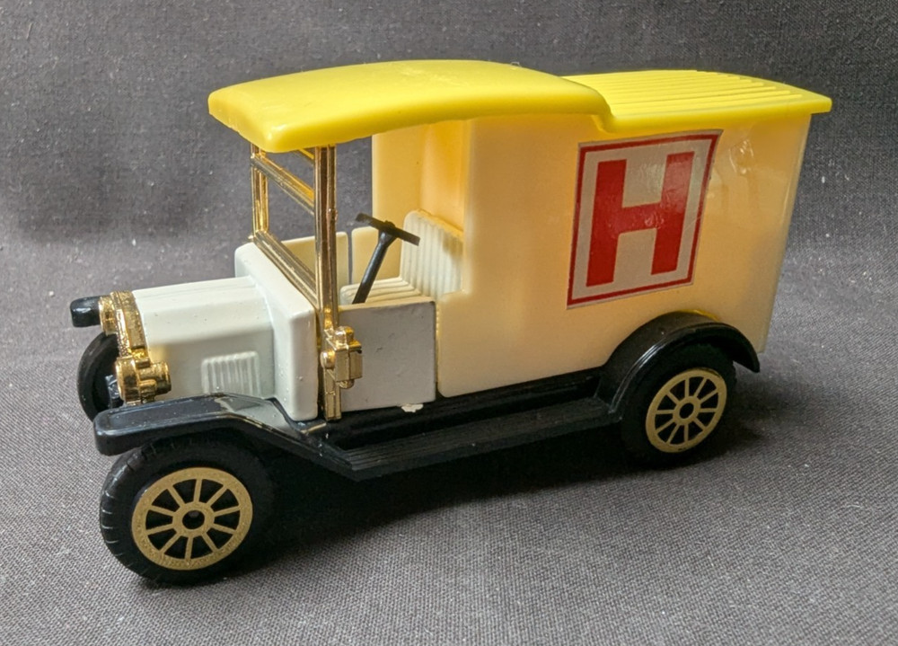4 Die Cast Vans -