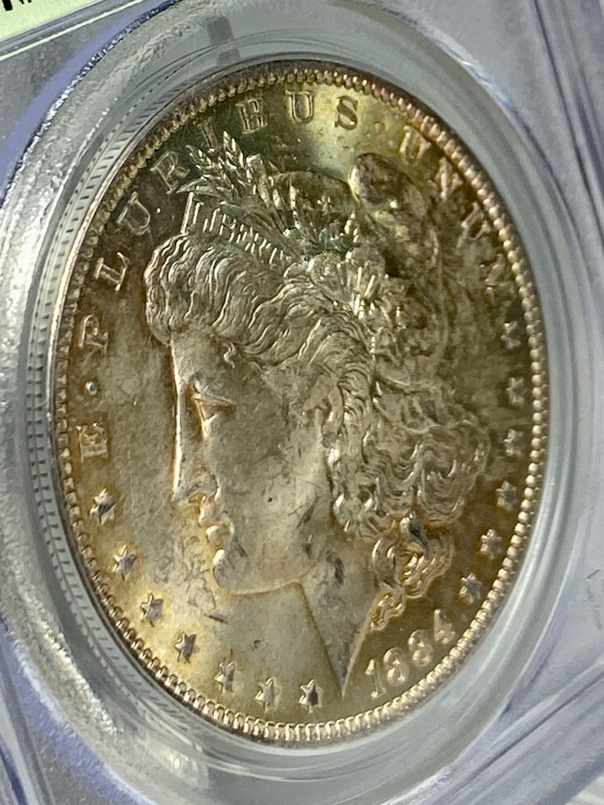 1884-O Morgan Silver 1$ Dollar PCGS MS 63 OGH Yellow with Blue Toned