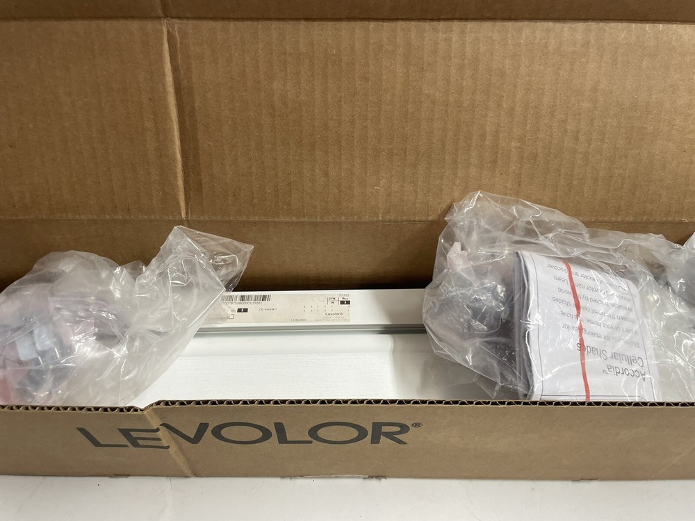 Levlor Honeycomb Blind W:23 L: 61 1/2 With Installation Brackets