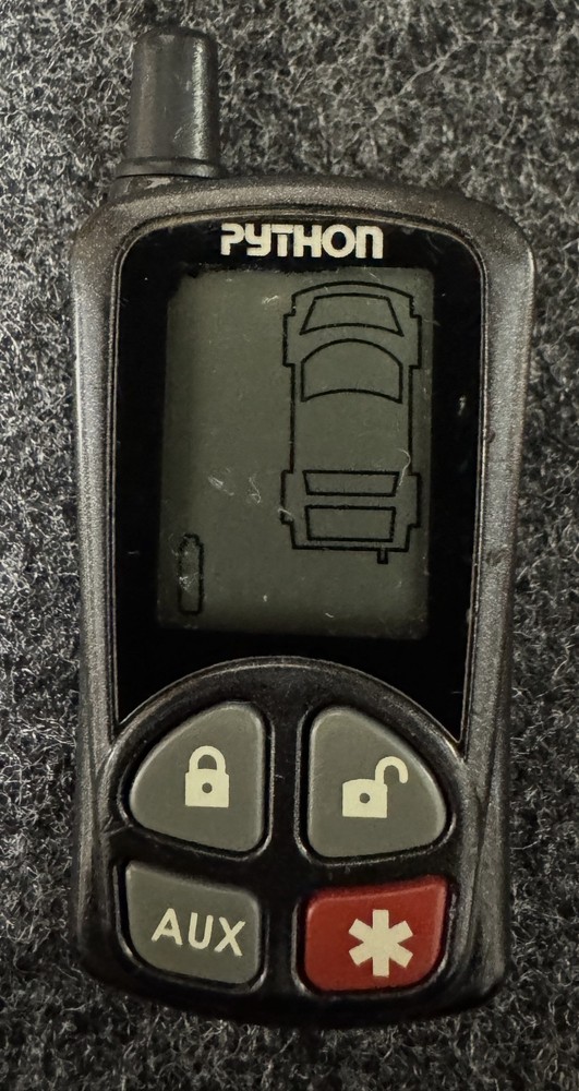 Python V/P/C EZSDEI478 Remote/USED/Case Clip Broke/Light Up/No Confirm on Trans