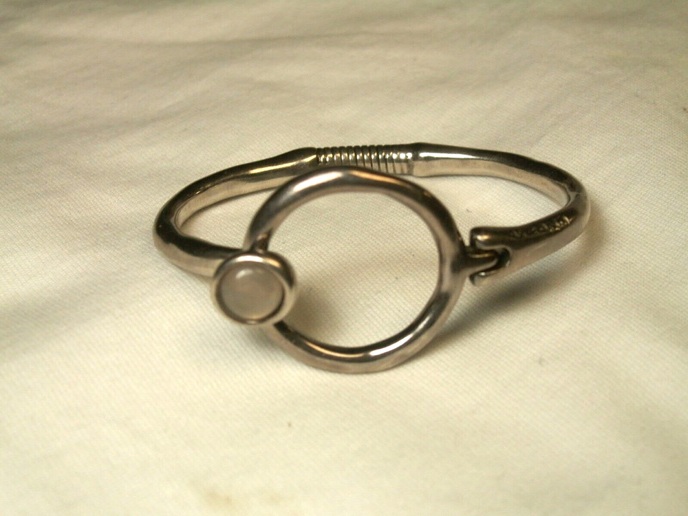 ...Unode50...Silver Tone, Quartz Hinged Bracelet...