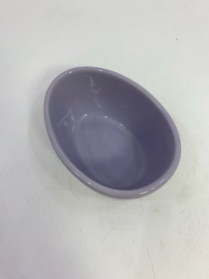 PURPLE EASTER EGG CUTOUT CANDY DISH.