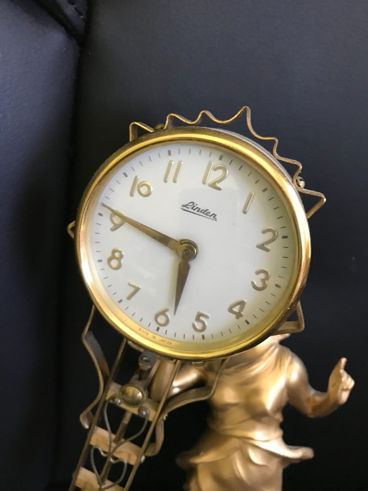 Linden Swinging Diane Clock