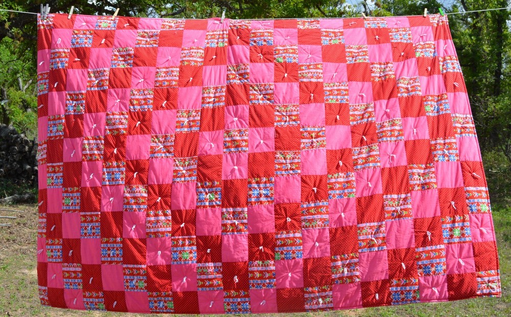 Homemade pink/red tied method patchwork quilt 57x82"