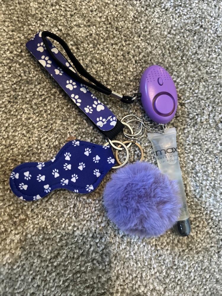 self-defense safety keychain set. The set includes various accessories