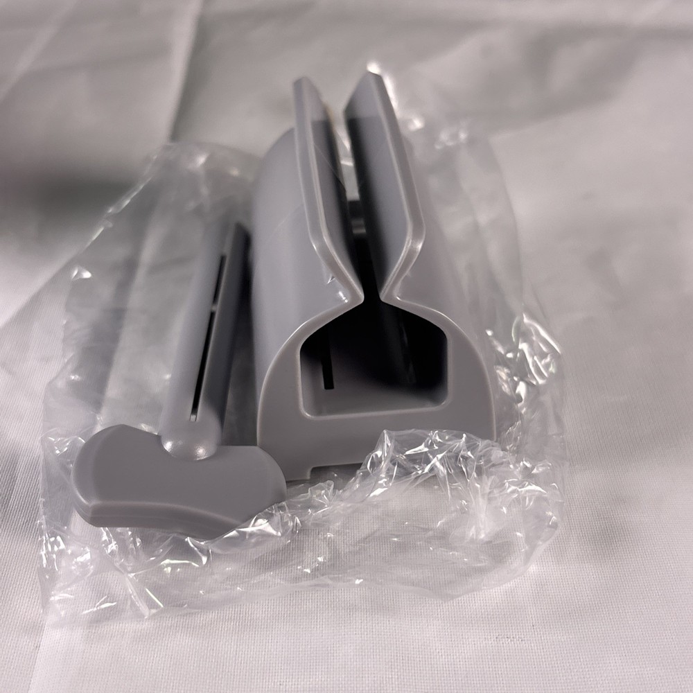 Plastic Tube Squeezer Toothpaste Dispenser Holder Rolling Bathroom Extract