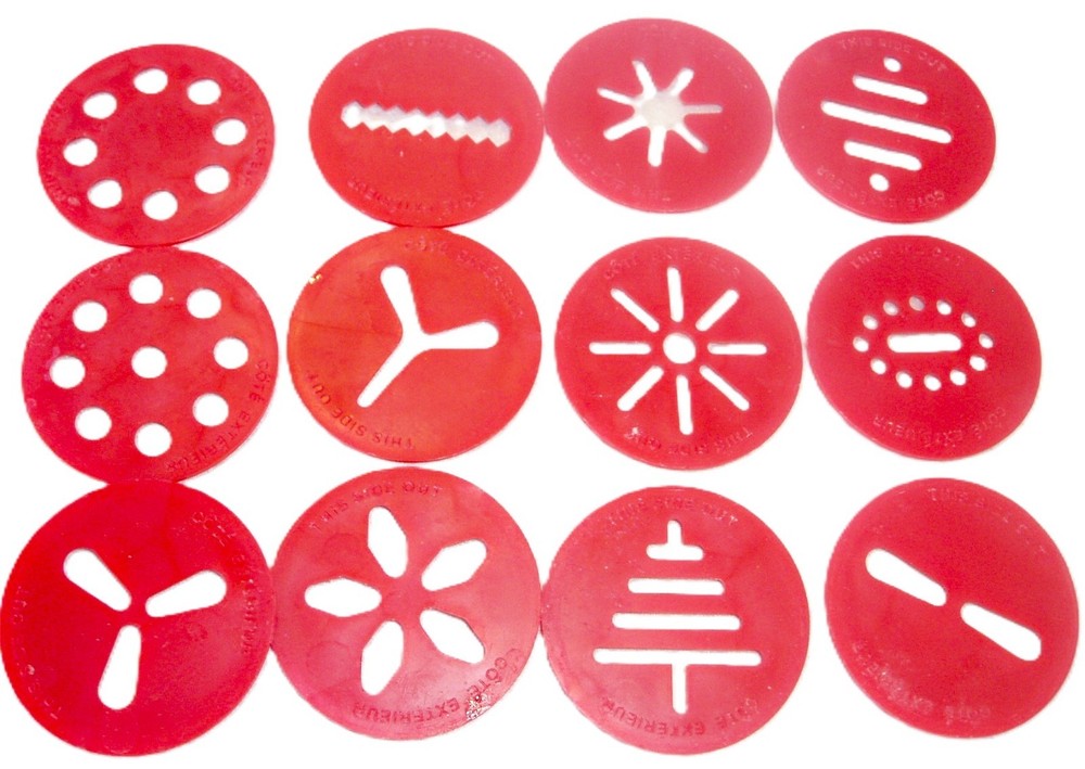 12 RED PLASTIC DISCS FROM A WHITE WILTON COOKIE PRESS