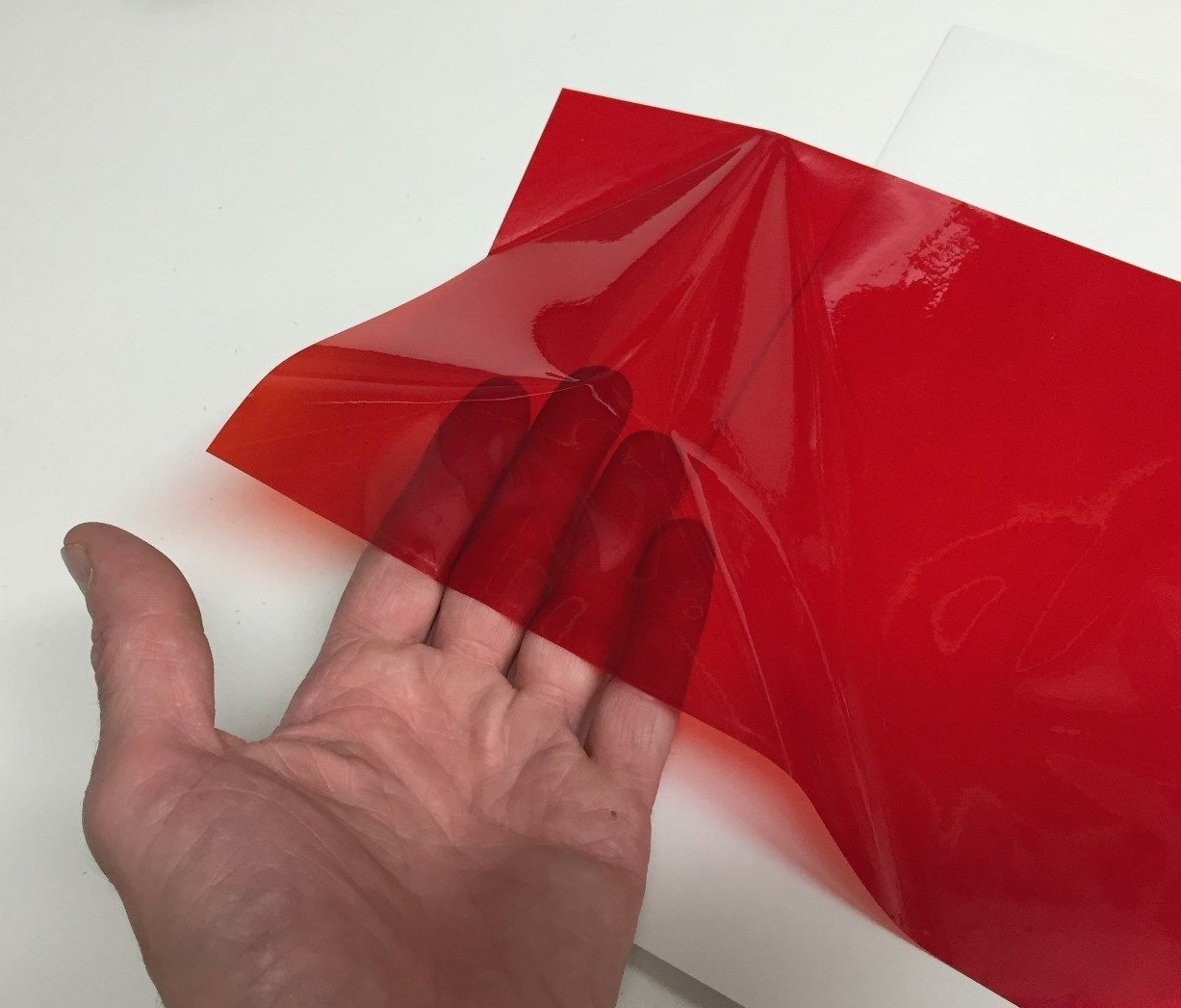 Long-Life RED Transparent Vinyl 24 inch x 10 ft, adhesive coated plastic film
