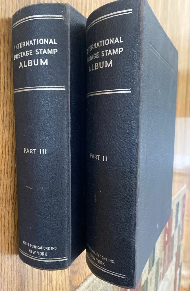 SCOTT'S INTERNATIONAL PART II & PART III STAMP ALBUMS WITH ABOUT 2000 STAMPS