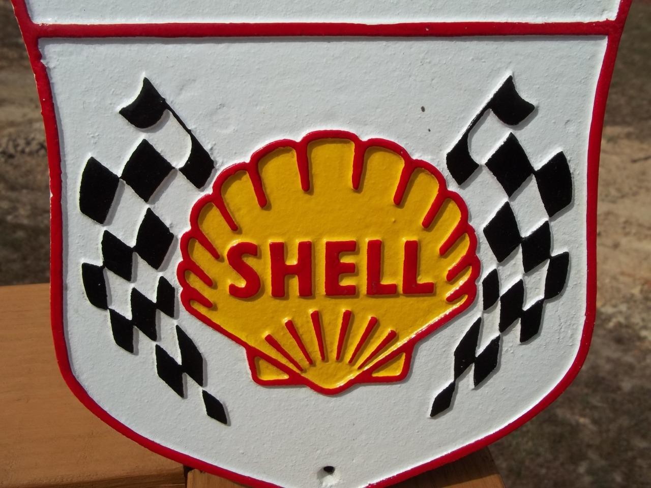 CAST IRON TRIUMPH SHELL CHECKERED FLAG WALL SIGN ADVERTISING SIGN MOTORCYCLE GAS