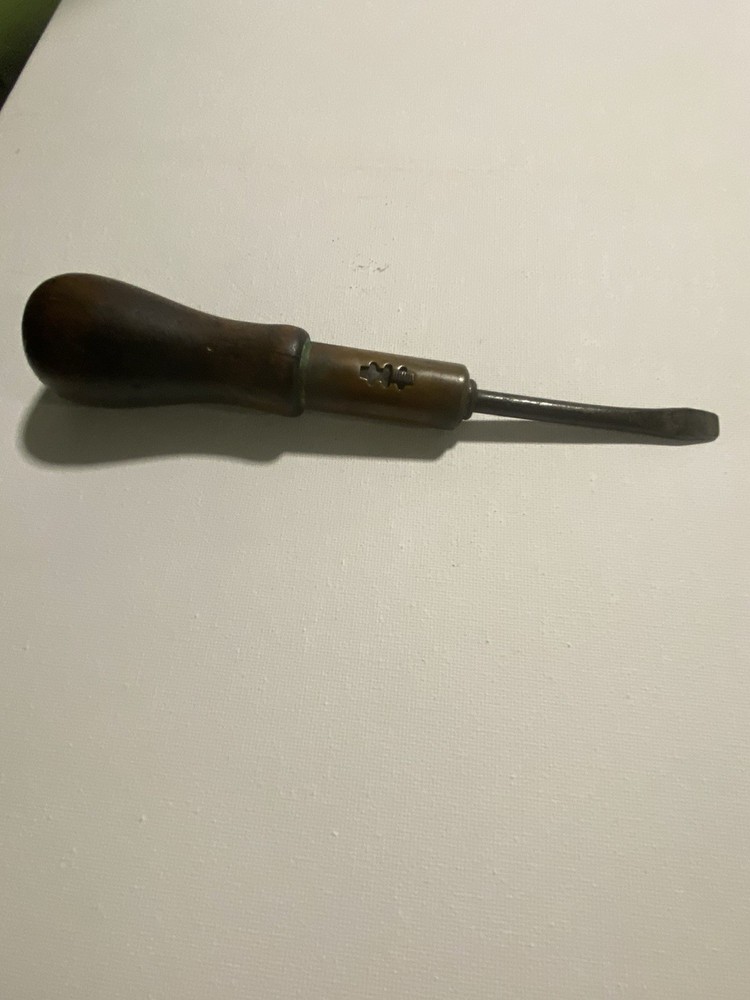 Antique Ratcheting Tool With Wood Handle