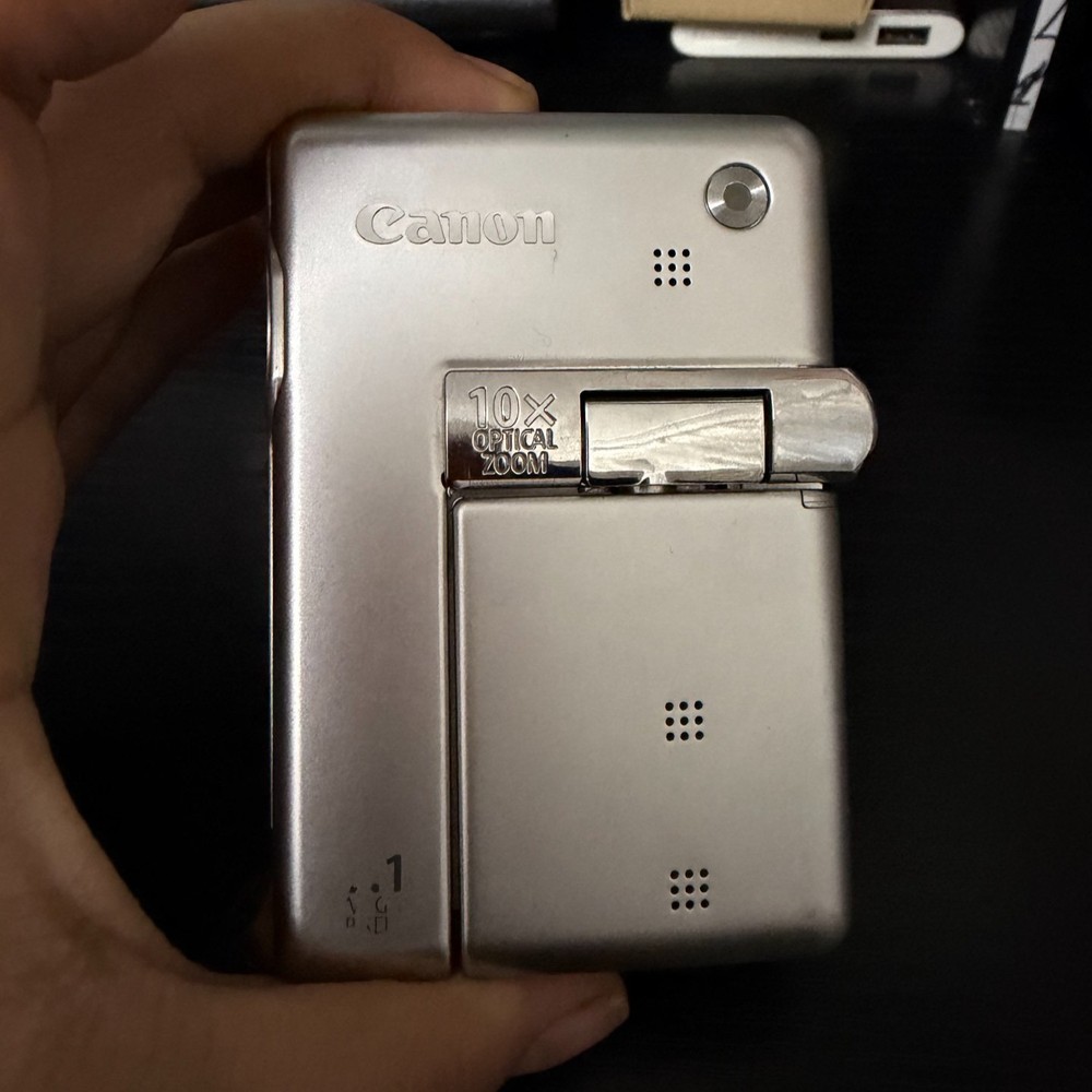 Canon PowerShot TX1 Digital Camera 7.1 MP 10x Optical Zoom Image Stabilization