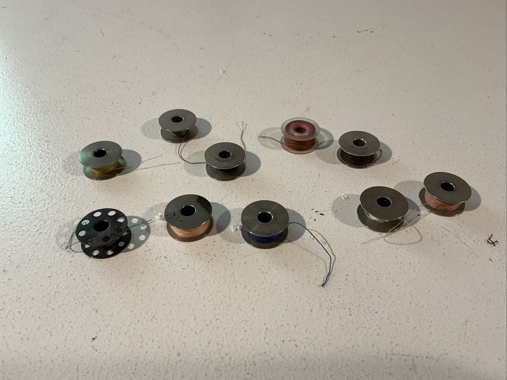 10 Vintage Sewing Machine Bobbins; ES0824