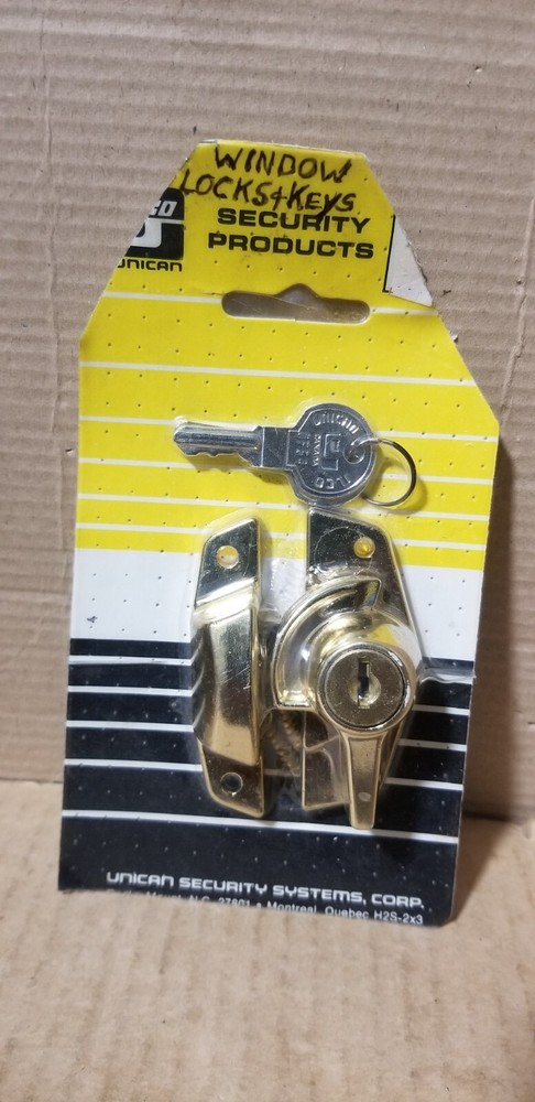 ilco Unican Security Products Brass Security Window Lock. NOS-Damaged packaging