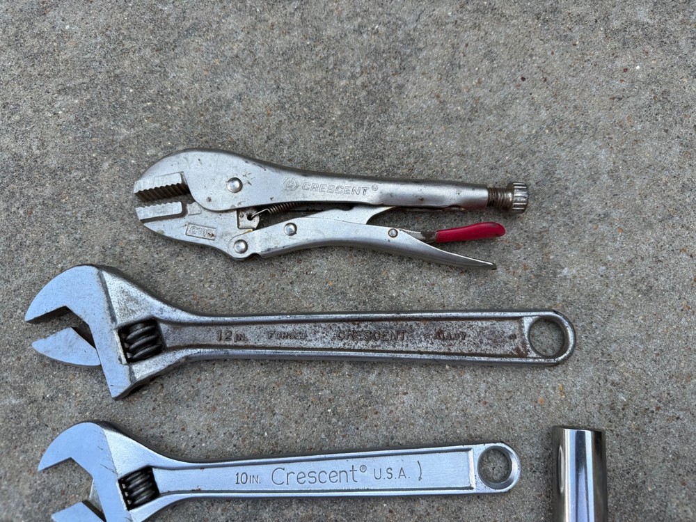 Crescent Tool adjustable wrench, locking plier, two ratcheting wrenches, socket