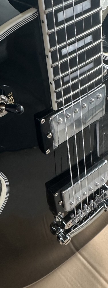 Customized electric guitar, black glossy, silver accessories, imported/from US